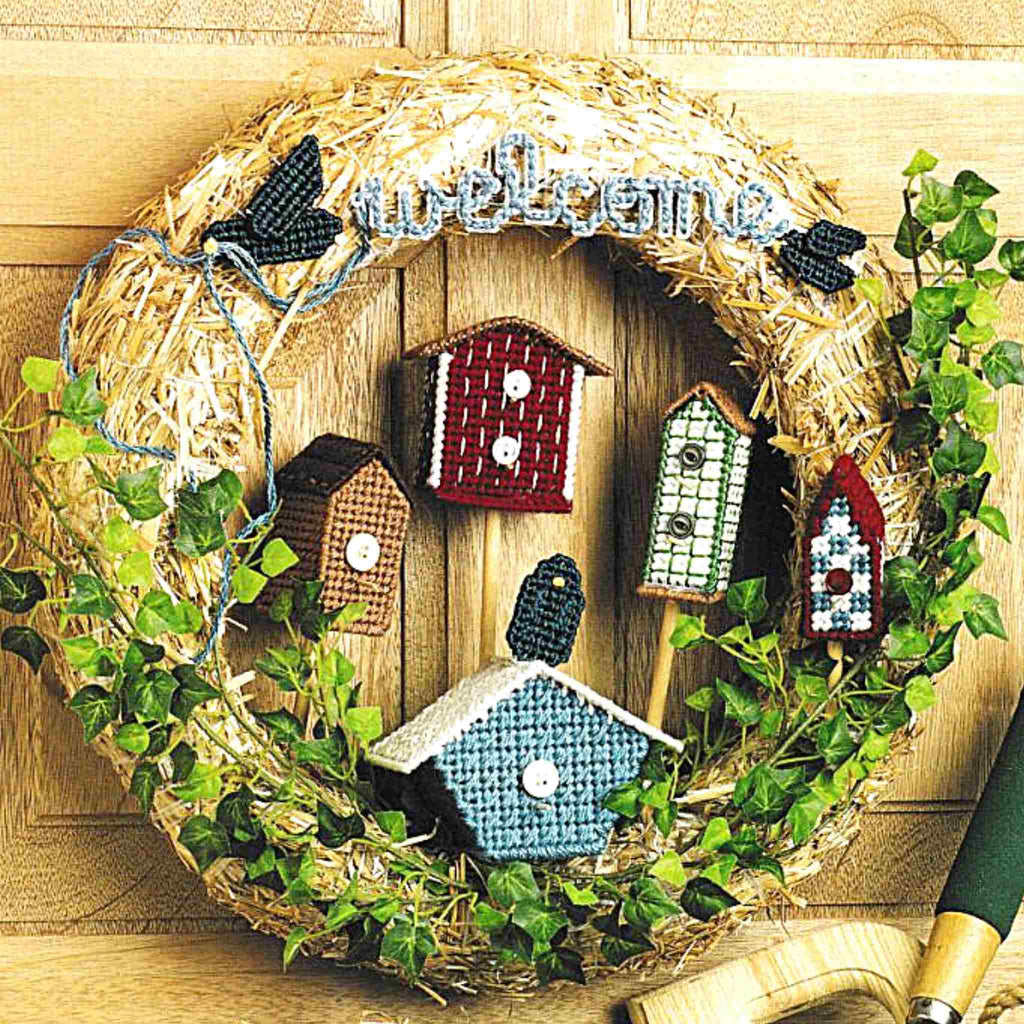 Vintage Plastic Canvas Pattern: Birdhouse Wreath. Basic materials you'll need are a straw wreath, 7-count plastic canvas sheets, and worsted/ #4 medium-weight yarn. 