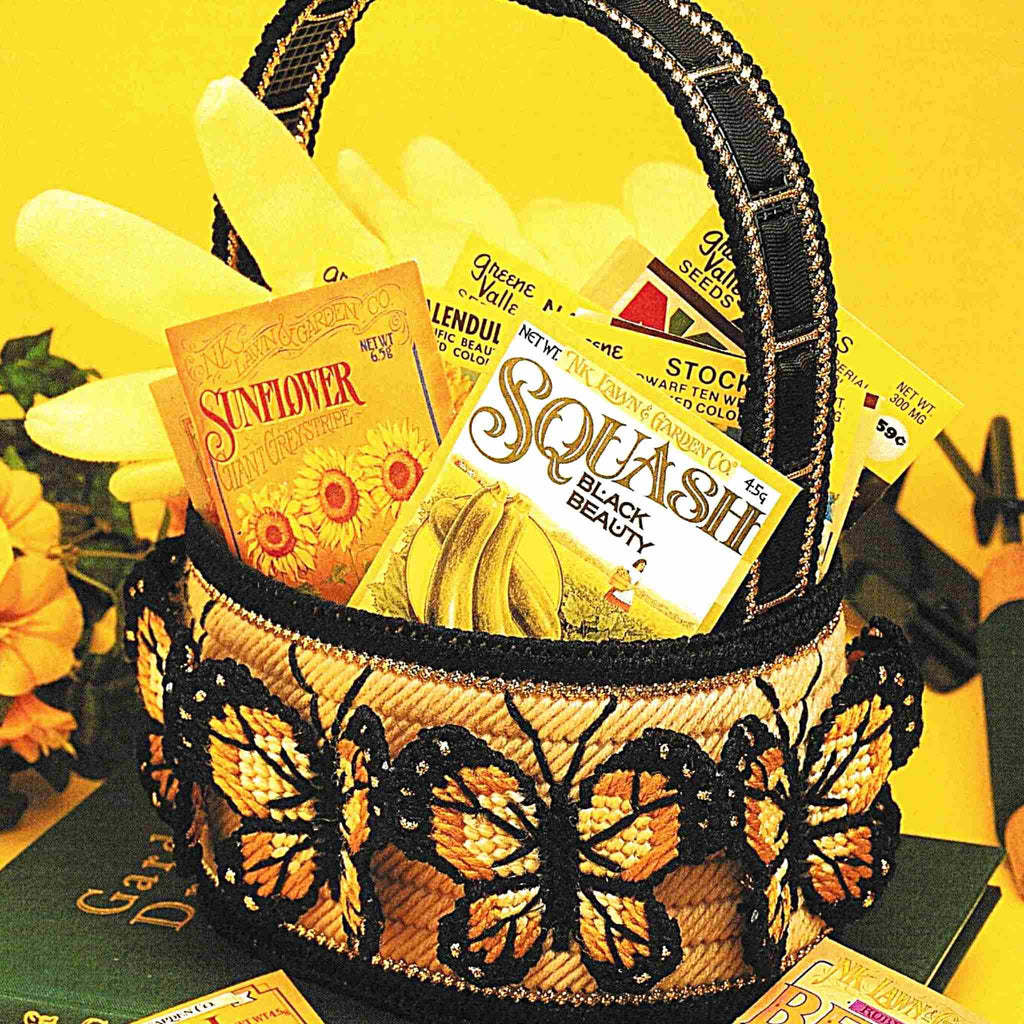 Vintage Plastic Canvas Pattern: Butterflies Basket. Basic materials you'll need are 7-count plastic canvas sheets and worsted/ #4 medium-weight yarn. detail