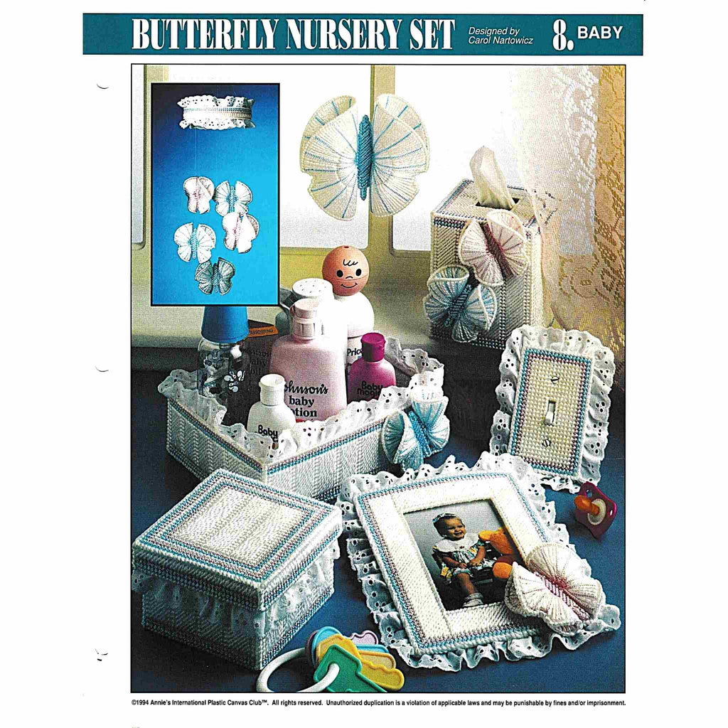 Vintage Plastic Canvas Pattern: Butterfly Nursery Set. Charts included for Butterfly Mobile, Switchplate Cover, Trinket Box, Butterfly Tissue Box Cover, Butterfly Window Hanger, Butterfly Picture Frame, and Butterfly Organizer Tray. cover