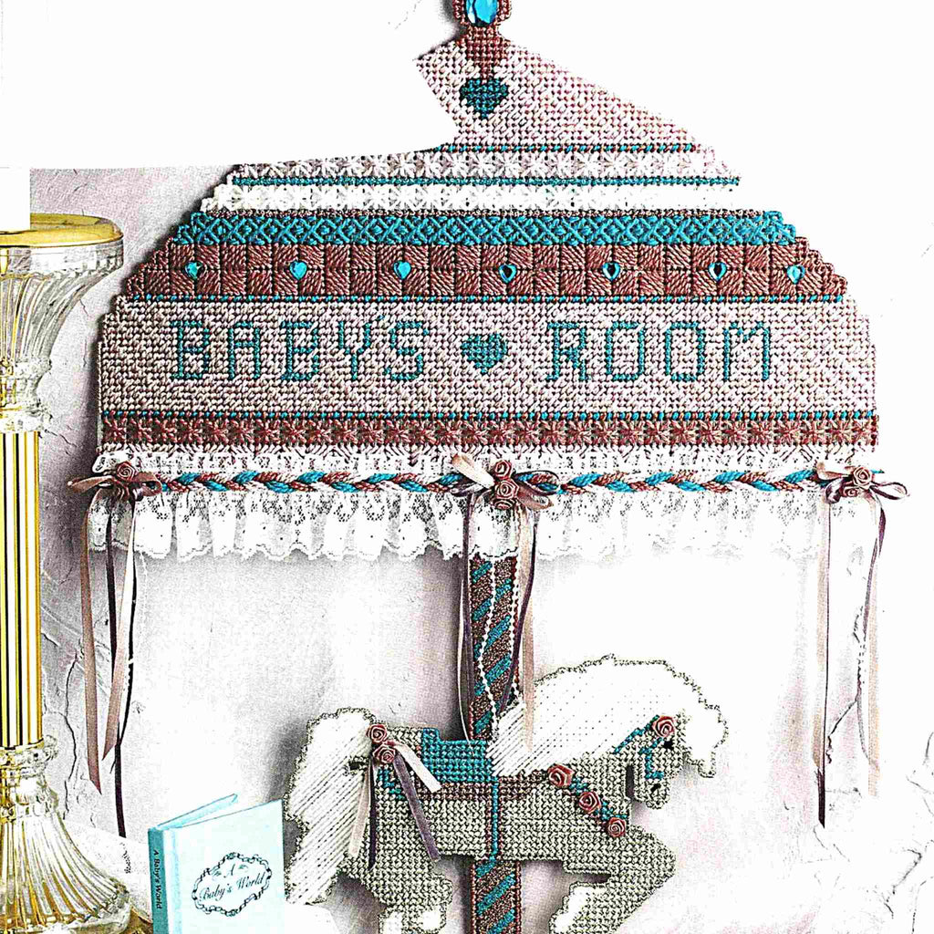 Vintage Plastic Canvas Pattern: Carousel Horse Wall Hanging. Create this sweet baby's nursery wall decor out of 7-count plastic canvas sheets and worsted / medium-weight yarn. 