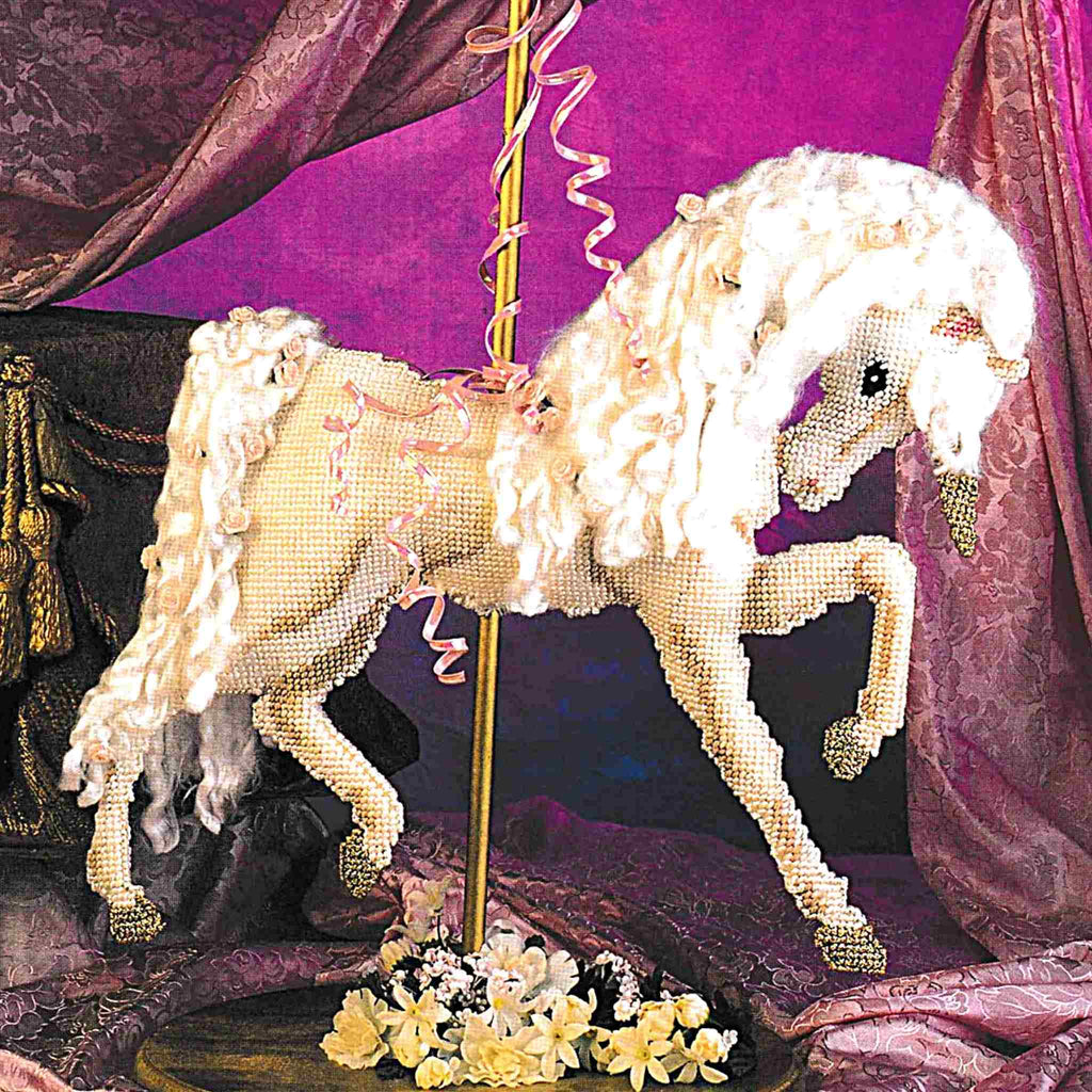 Vintage Plastic Canvas Pattern: Carousel Unicorn. Create this sweet unicorn kid's room decor out of 7-count plastic canvas sheets and worsted / medium-weight yarn. 