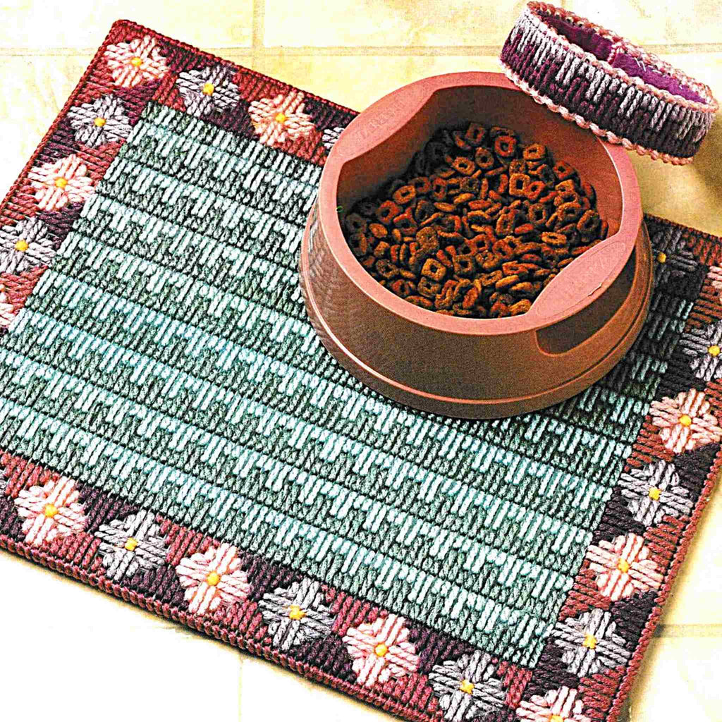 Vintage Plastic Canvas Pattern: Cat Mat & Collar. Stitch up this cat food placemat and decorative collar with 7-count plastic canvas sheets and worsted / medium-weight yarn. 