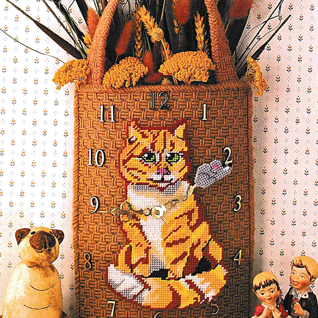 Vintage Plastic Canvas Pattern: Cat & Mouse Clock. Create this cozy wall clock out of 7-count and 10-mesh plastic canvas sheets and worsted / medium-weight yarn.