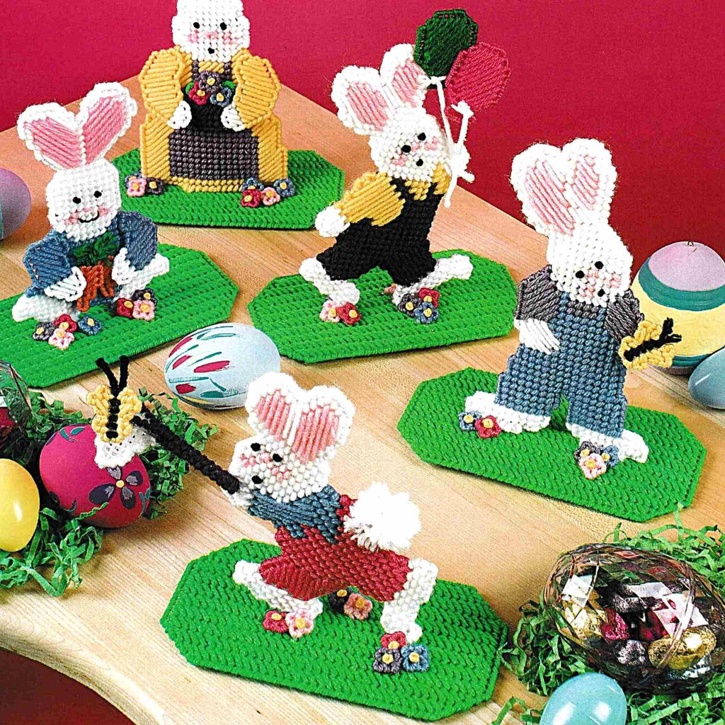 Vintage Easter Plastic Canvas Pattern: Easter Bunny Favors.  Let yourself get caught up in the fun and frolic of this family of five playful bunnies to be made using yarn and 7-count plastic canvas. detail