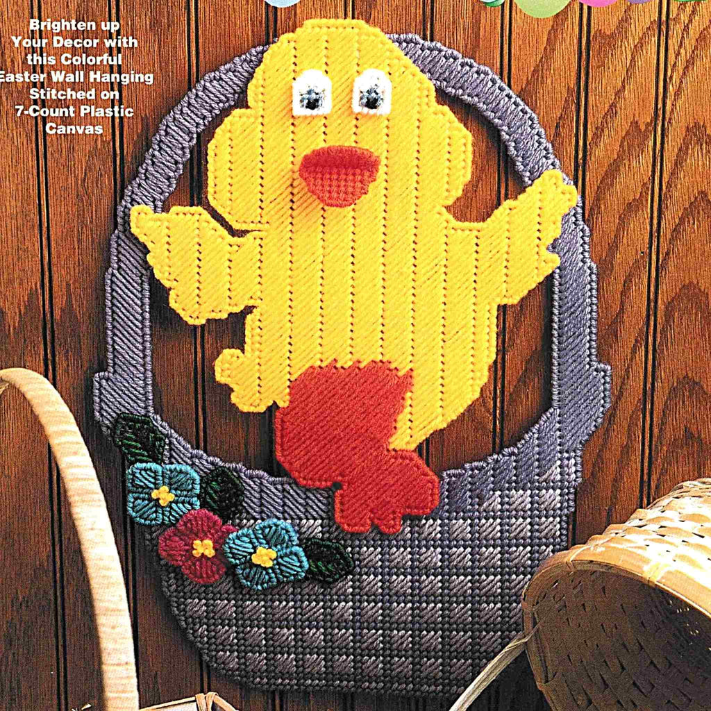 Vintage Easter Plastic Canvas Pattern: Easter Ducky.  Brighten up your decor with this colorful Easter wall hanging made using worsted-weight yarn and 7-count plastic canvas.