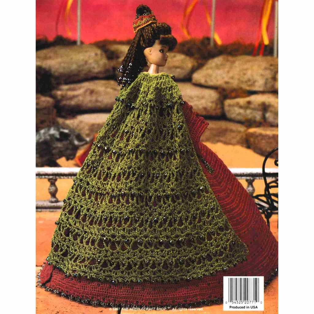 Vintage Fashion Doll Thread Crochet Pattern: Ladies of Fashion, Eleanora of Spain. Rich in Spanish culture and regal beauty, this majestic two-piece gown and cape signifies dramatic design set off by delicate inlaid beads and trimmings of lustrous black. Stitched using size-10 bedspread cotton for your 11-½" fashion doll.